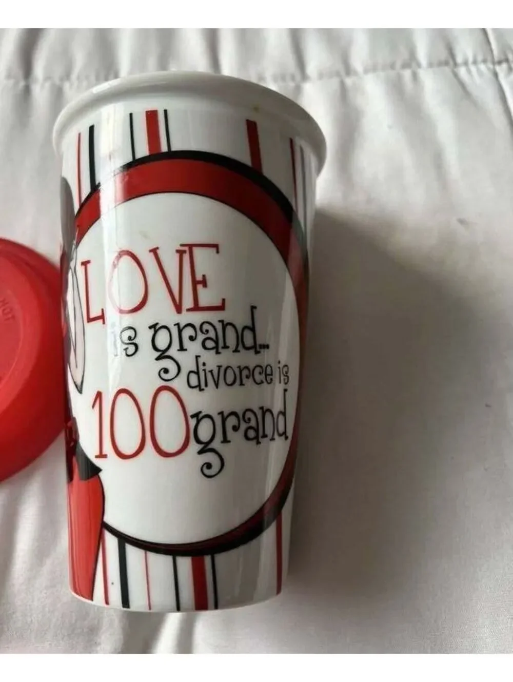 DRINKWARE Ceramic Travel Coffee Mug with Red Silicone Lid and Artistic Design